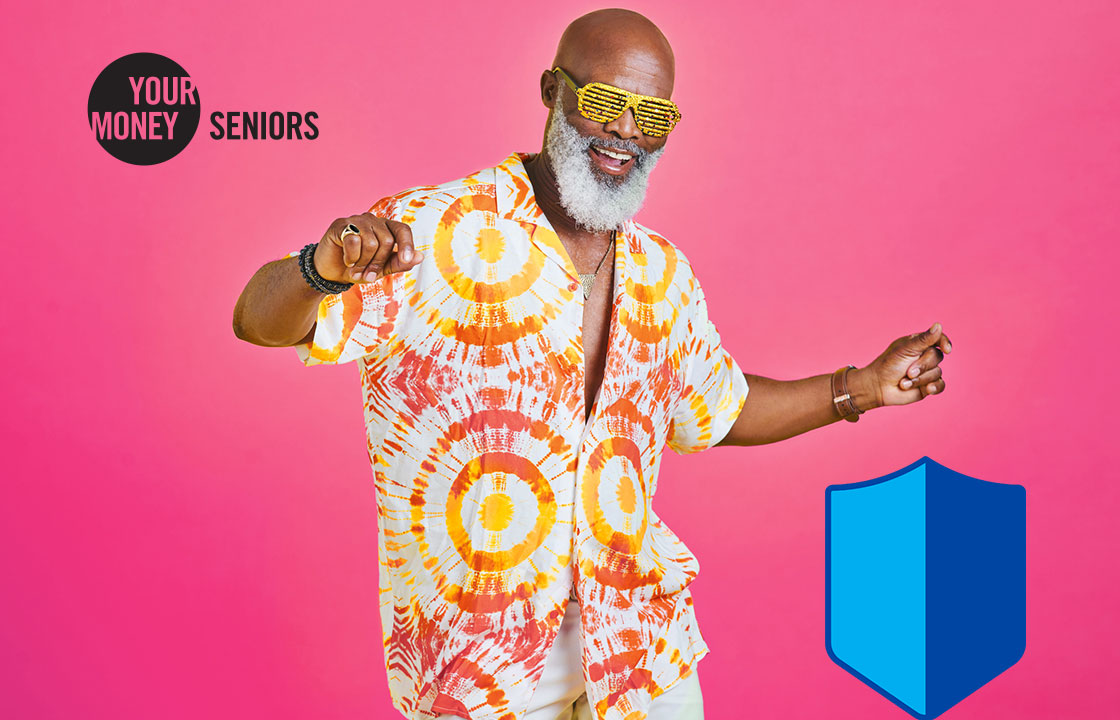 senior man dancing while wearing funky glasses and a colourful shirt